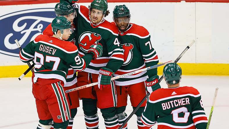 Mar 2, 2021; Newark, New Jersey, USA; New Jersey Devils left wing Miles Wood (44) celebrates with teammates after scoring a goal against the New York Islanders during the third period at Prudential Center. Mandatory Credit: Vincent Carchietta-USA TODAY Sports