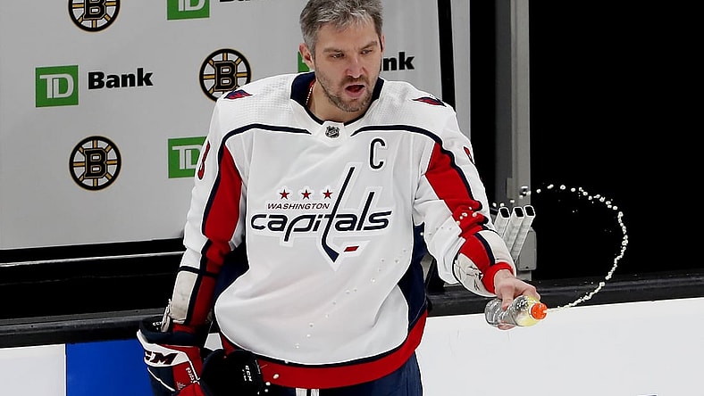 Mar 3, 2021; Boston, Massachusetts, USA; Washington Capitals left wing Alex Ovechkin (8) squirts a bottle before their game against the Boston Bruins at TD Garden. Mandatory Credit: Winslow Townson-USA TODAY Sports