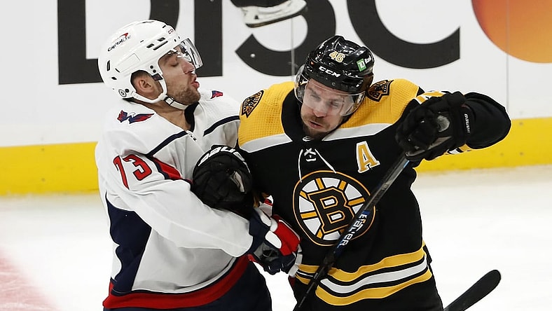 Mar 3, 2021; Boston, Massachusetts, USA; Boston Bruins center David Krejci (46) collides with Washington Capitals left wing Conor Sheary (73) during the second period at TD Garden. Mandatory Credit: Winslow Townson-USA TODAY Sports