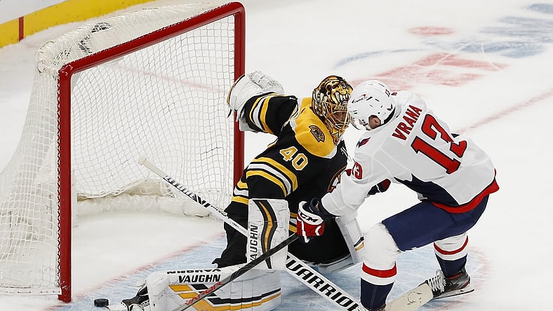 Mar 3, 2021; Boston, Massachusetts, USA; Washington Capitals left wing Jakub Vrana (13) scores past Boston Bruins goaltender Tuukka Rask (40) during a shootout at TD Garden. Mandatory Credit: Winslow Townson-USA TODAY Sports