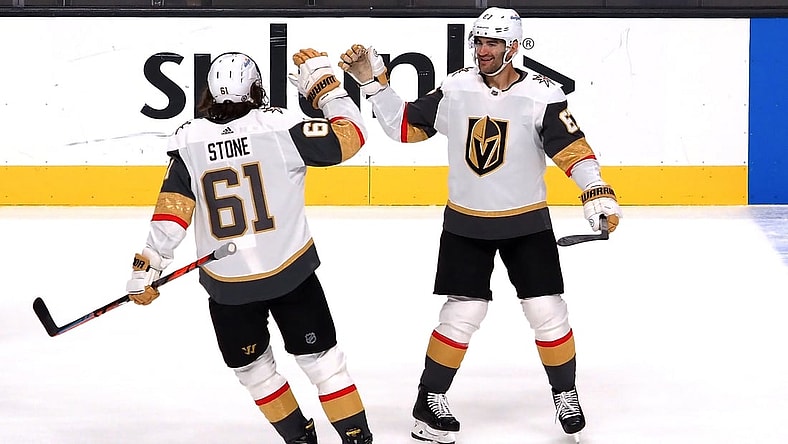 Mar 5, 2021; San Jose, California, USA; Vegas Golden Knights left wing Max Pacioretty (67) celebrates with right wing Mark Stone (61) after scoring the game winning goal against the San Jose Sharks during the overtime period at SAP Center at San Jose. Mandatory Credit: Kelley L Cox-USA TODAY Sports