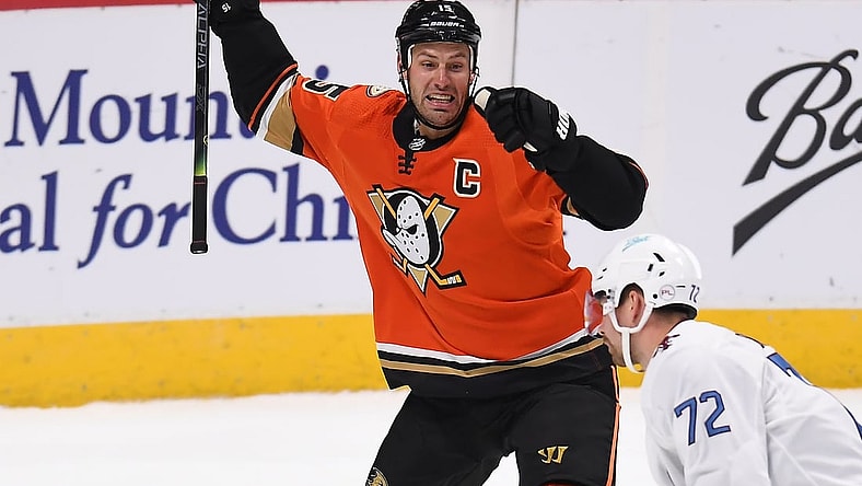 Mar 6, 2021; Denver, Colorado, USA; Anaheim Ducks center Ryan Getzlaf (15) celebrates after scoring the overtime winning goal against the Colorado Avalanche at Ball Arena. Mandatory Credit: Ron Chenoy-USA TODAY Sports