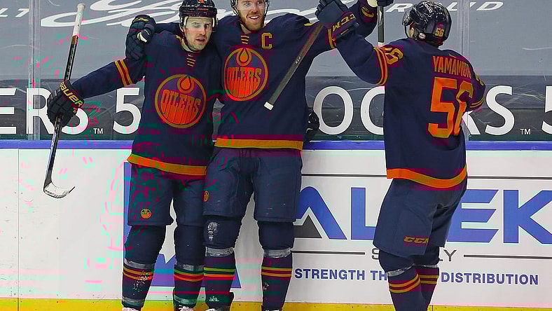 Mar 6, 2021; Edmonton, Alberta, CAN; Edmonton Oilers forward Connor McDavid (97) celebrates after scoring the game winning goal against the Calgary Flames in the third period at Rogers Place. Mandatory Credit: Perry Nelson-USA TODAY Sports