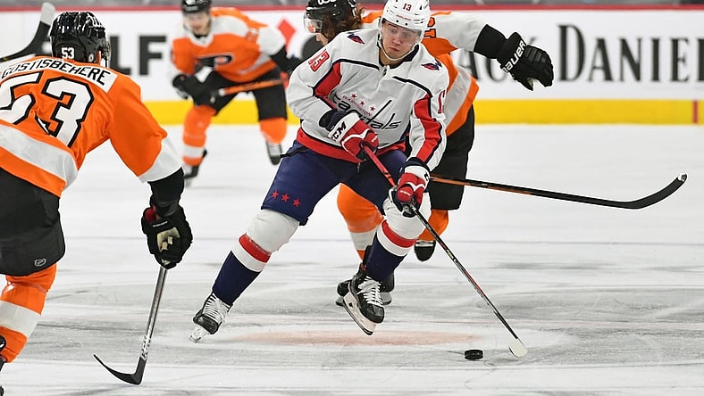 Mar 7, 2021; Philadelphia, Pennsylvania, USA; Washington Capitals left wing Jakub Vrana (13) carries the puck into Philadelphia Flyers zone during the first period at Wells Fargo Center. Mandatory Credit: Eric Hartline-USA TODAY Sports