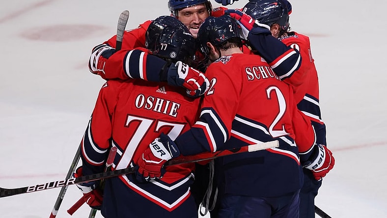 Mar 9, 2021; Washington, District of Columbia, USA; Washington Capitals right wing T.J. Oshie (77) celebrates with teammates after scoring goal against the New Jersey Devils in the first period at Capital One Arena. Mandatory Credit: Geoff Burke-USA TODAY Sports