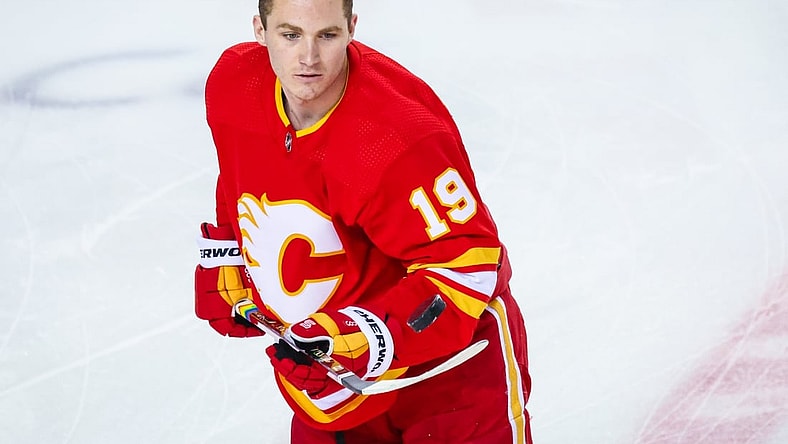 Mar 13, 2021; Calgary, Alberta, CAN; Calgary Flames left wing Matthew Tkachuk (19) controls the puck during the warmup period against the Montreal Canadiens at Scotiabank Saddledome. Mandatory Credit: Sergei Belski-USA TODAY Sports