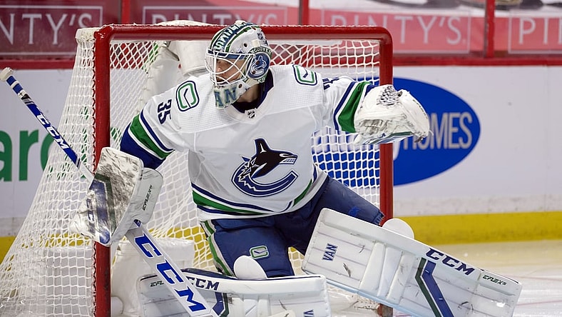 Mar 15, 2021; Ottawa, Ontario, CAN; Vancouver Canucks goalie Thatcher Demko (35) warms up prior to the start of the second period against the Ottawa Senators at the Canadian Tire Centre. Mandatory Credit: Marc DesRosiers-USA TODAY Sports