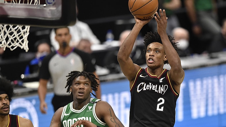 Mar 17, 2021; Cleveland, Ohio, USA; Cleveland Cavaliers guard Collin Sexton (2) shoots in the fourth quarter against the Boston Celtics at Rocket Mortgage FieldHouse. Mandatory Credit: David Richard-USA TODAY Sports