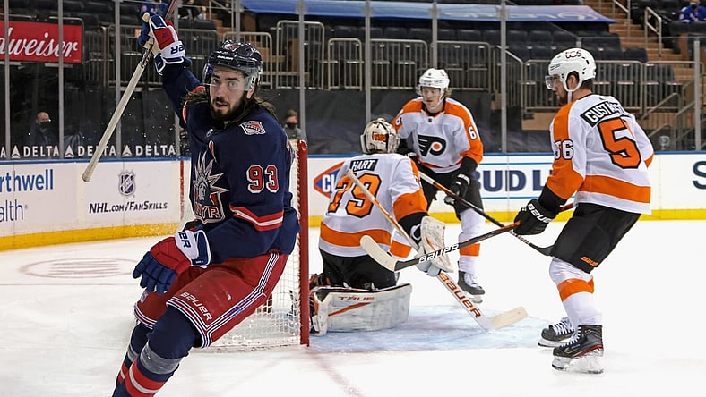 Mar 17, 2021; New York, New York, USA; New York Rangers center Mika Zibanejad (93) celebrates after scoring a power-play goal against Philadelphia Flyers goaltender Carter Hart (79) at 14:29 of the second period at Madison Square Garden. Mandatory Credit:  Bruce Bennett/POOL PHOTOS-USA TODAY Sports