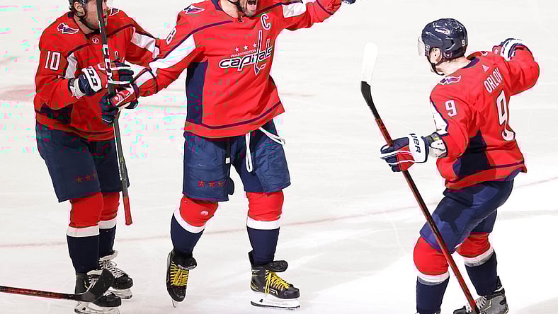 Mar 19, 2021; Washington, District of Columbia, USA;Washington Capitals left wing Alex Ovechkin (8) celebrates with Capitals defenseman Dmitry Orlov (9) and Capitals right wing Daniel Sprong (10) after scoring the go ahead goal against the New York Rangers in the third period at Capital One Arena. Mandatory Credit: Geoff Burke-USA TODAY Sports