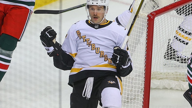 Mar 20, 2021; Newark, New Jersey, USA; Pittsburgh Penguins right wing Bryan Rust (17) celebrates his goal during the second period of their game against the New Jersey Devils at Prudential Center. Mandatory Credit: Ed Mulholland-USA TODAY Sports