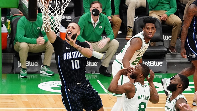 Mar 21, 2021; Boston, Massachusetts, USA; Orlando Magic guard Evan Fournier (10) drives to the basket against Boston Celtics guard Kemba Walker (8) in the second quarter at TD Garden. Mandatory Credit: David Butler II-USA TODAY Sports