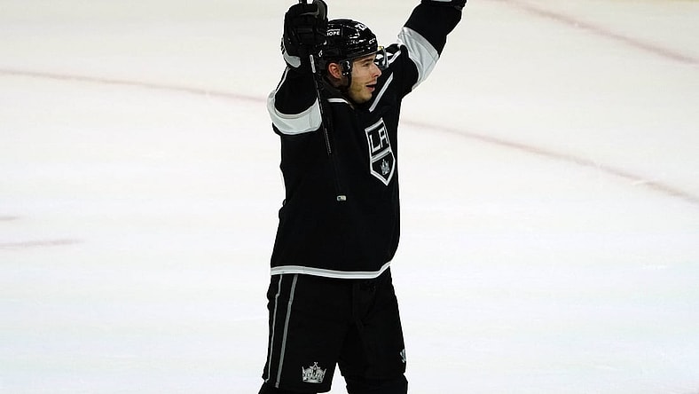 Mar 21, 2021; Los Angeles, California, USA; Los Angeles Kings right wing Dustin Brown (23) celebrates the 3-1 victory against the Vegas Golden Knights at Staples Center. Mandatory Credit: Gary A. Vasquez-USA TODAY Sports