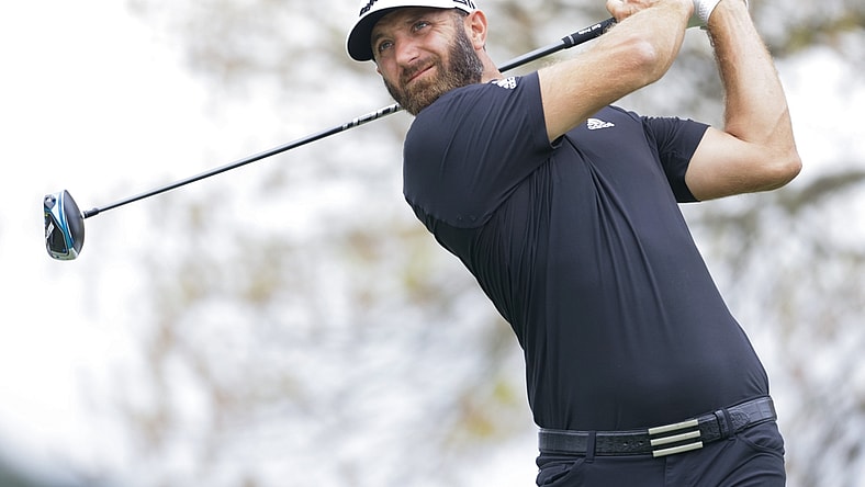 Mar 24, 2021; Austin, Texas, USA; Dustin Johnson plays his shot from the sixth tee during the first day of the WGC Dell Technologies Match Play golf tournament at Austin Country Club. Mandatory Credit: Erich Schlegel-USA TODAY Sports