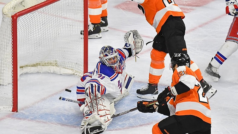 Mar 25, 2021; Philadelphia, Pennsylvania, USA; New York Rangers goaltender Igor Shesterkin (31) makes a save against Philadelphia Flyers center Claude Giroux (28) during the first period at Wells Fargo Center. Mandatory Credit: Eric Hartline-USA TODAY Sports