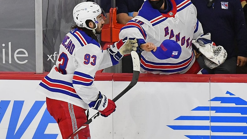 oMar 25, 2021; Philadelphia, Pennsylvania, USA; New York Rangers goaltender Alexandar Georgiev (40) tries to give  center Mika Zibanejad (93) a hat after he scored his third goal of the game against the Philadelphia Flyers during the second period at Wells Fargo Center. Mandatory Credit: Eric Hartline-USA TODAY Sports
