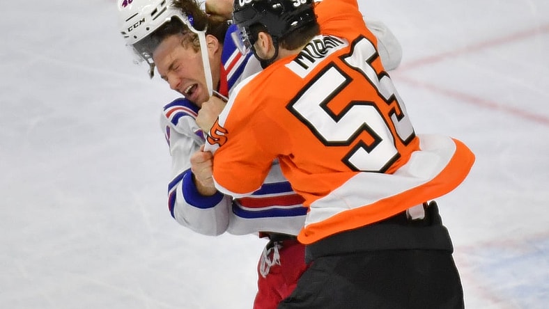 Mar 25, 2021; Philadelphia, Pennsylvania, USA; Philadelphia Flyers defenseman Samuel Morin (55) throws a punch against New York Rangers left wing Brendan Lemieux (48) during the third period at Wells Fargo Center. Mandatory Credit: Eric Hartline-USA TODAY Sports