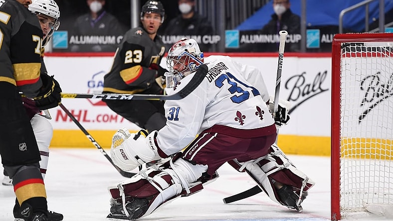 Mar 27, 2021; Denver, Colorado, USA; Colorado Avalanche goaltender Philipp Grubauer (31) defends his net in the first period against the Vegas Golden Knights at Ball Arena. Mandatory Credit: Ron Chenoy-USA TODAY Sports