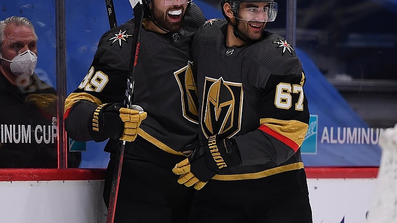Mar 27, 2021; Denver, Colorado, USA;Vegas Golden Knights left wing Max Pacioretty (67) and Vegas Golden Knights right wing Alex Tuch (89) celebrate an overtime period win over the Colorado Avalanche at Ball Arena. Mandatory Credit: Ron Chenoy-USA TODAY Sports