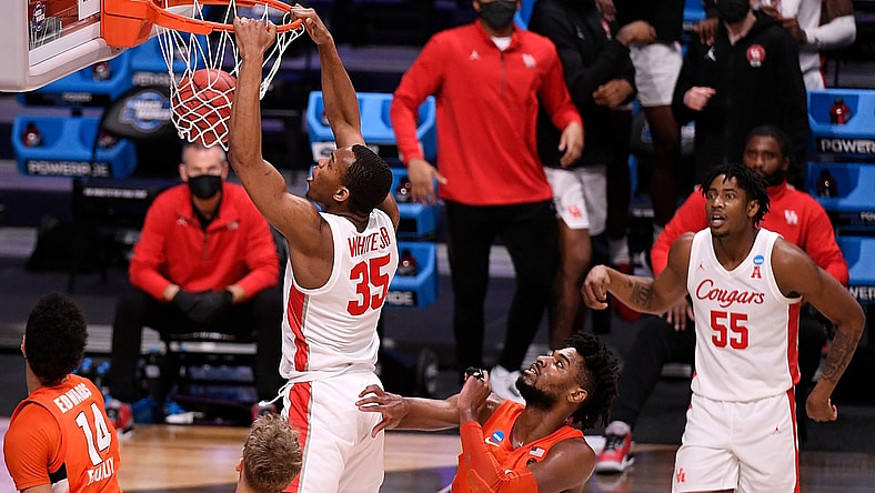 Mar 27, 2021; Indianapolis, Indiana, USA; Houston Cougars forward Fabian White Jr. (35) dunks during the second half against the Syracuse Orange in the Sweet Sixteen of the 2021 NCAA Tournament at Hinkle Fieldhouse. Mandatory Credit: Doug McSchooler-USA TODAY Sports