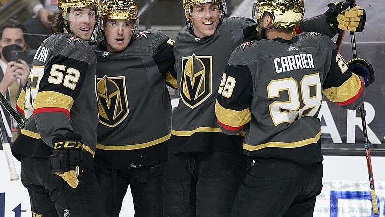 Mar 29, 2021; Las Vegas, Nevada, USA; Vegas Golden Knights celebrate after a goal by left wing Tomas Nosek (second from right) against the Los Angeles Kings during the second period at T-Mobile Arena. Mandatory Credit: John Locher/POOL PHOTOS-USA TODAY Sports