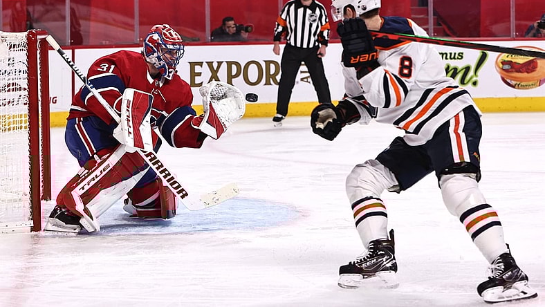 Mar 30, 2021; Montreal, Quebec, CAN; Montreal Canadiens goaltender Carey Price (31) makes a save against Edmonton Oilers center Kyle Turris (8) during the first period at Bell Centre. Mandatory Credit: Jean-Yves Ahern-USA TODAY Sports