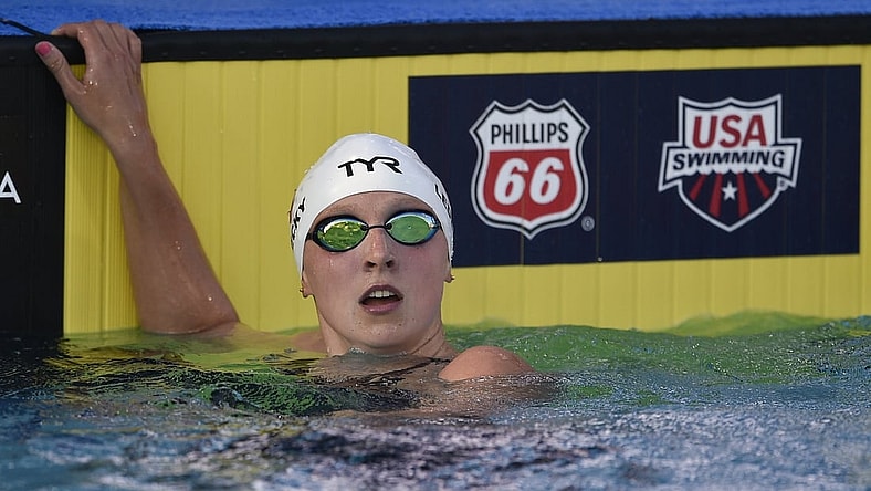 Jul 25, 2018; Irvine, CA, USA; Katie Ledecky looks at her time after winning the Women's 800 LC Meter Freestyle Final during the 2018 USA Swimming Phillips 66 National Championships swim meet at William Woollet, Jr. Aqua Center. Mandatory Credit: Kelvin Kuo-USA TODAY Sports