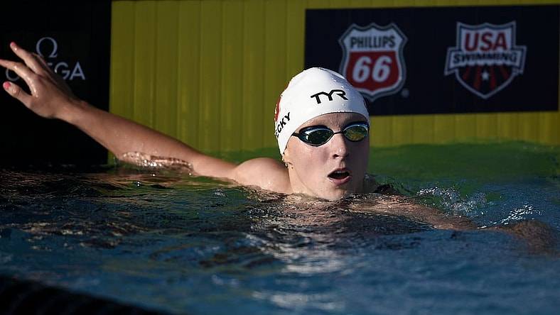 Jul 26, 2018; Irvine, CA, USA; Katie Ledecky (right) looks on after winning the Women's 200 LC Meter Freestyle final during the 2018 USA Swimming Phillips 66 National Championships swim meet at William Woollett, Jr. Aquatics Center. Mandatory Credit: Kelvin Kuo-USA TODAY Sports