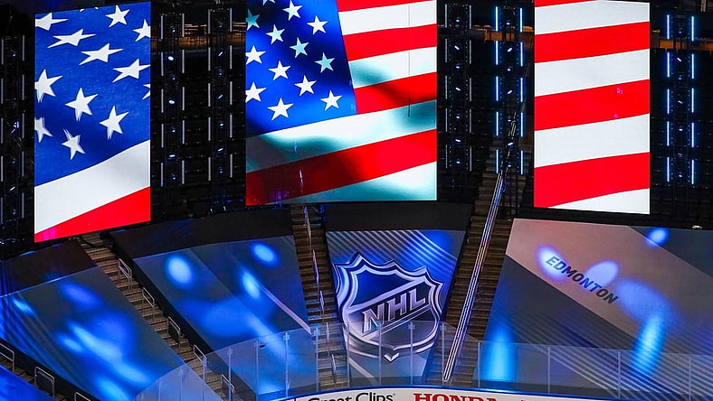 Aug 12, 2020; Edmonton, Alberta, CAN; General view of American flag and NHL logo prior to the game between the St. Louis Blues and the Vancouver Canucks in game one of the first round of the 2020 Stanley Cup Playoffs at Rogers Place. Mandatory Credit: Sergei Belski-USA TODAY Sports