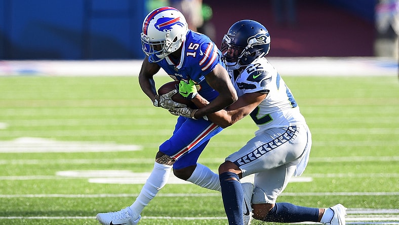Nov 8, 2020; Orchard Park, New York, USA; Buffalo Bills wide receiver John Brown (15) catches a pass in front of Seattle Seahawks cornerback Quinton Dunbar (22) during the second quarter at Bills Stadium. Mandatory Credit: Rich Barnes-USA TODAY Sports