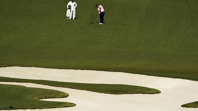 Nov 14, 2020; Augusta, Georgia, USA; Bryson DeChambeau plays his shot from the tenth fairway during the third round of The Masters golf tournament at Augusta National GC. Mandatory Credit: Rob Schumacher-USA TODAY Sports
