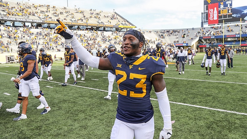 Nov 14, 2020; Morgantown, West Virginia, USA; West Virginia Mountaineers safety Tykee Smith (23) celebrates after defeating the TCU Horned Frogs at Mountaineer Field at Milan Puskar Stadium. Mandatory Credit: Ben Queen-USA TODAY Sports