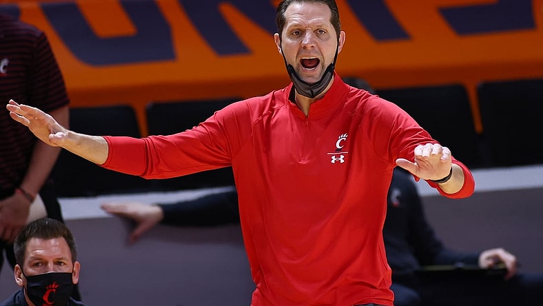 Dec 12, 2020; Knoxville, Tennessee, USA; Cincinnati Bearcats head coach John Brannen reacts during the first half against the Tennessee Volunteers at Thompson-Boling Arena. Mandatory Credit: Randy Sartin-USA TODAY Sports