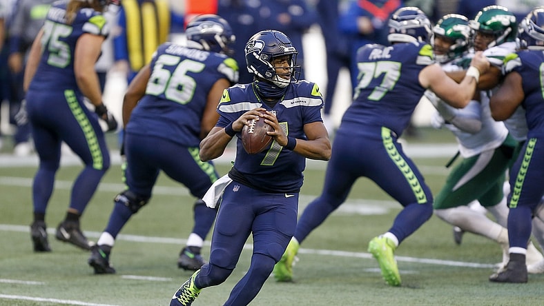 Dec 13, 2020; Seattle, Washington, USA; Seattle Seahawks quarterback Geno Smith (7) passes against the New York Jets during the fourth quarter at Lumen Field. Mandatory Credit: Joe Nicholson-USA TODAY Sports