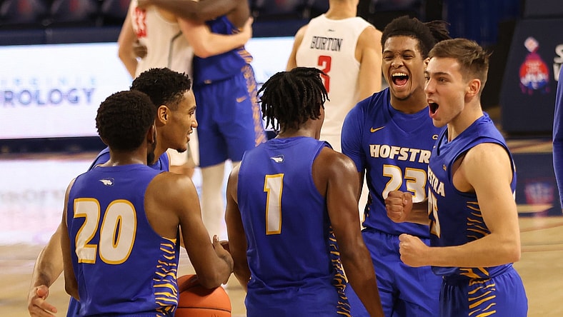 Dec 22, 2020; Richmond, Virginia, USA; Hofstra Pride players celebrate on the court after their game against the Richmond Spiders at Robins Center. Mandatory Credit: Geoff Burke-USA TODAY Sports