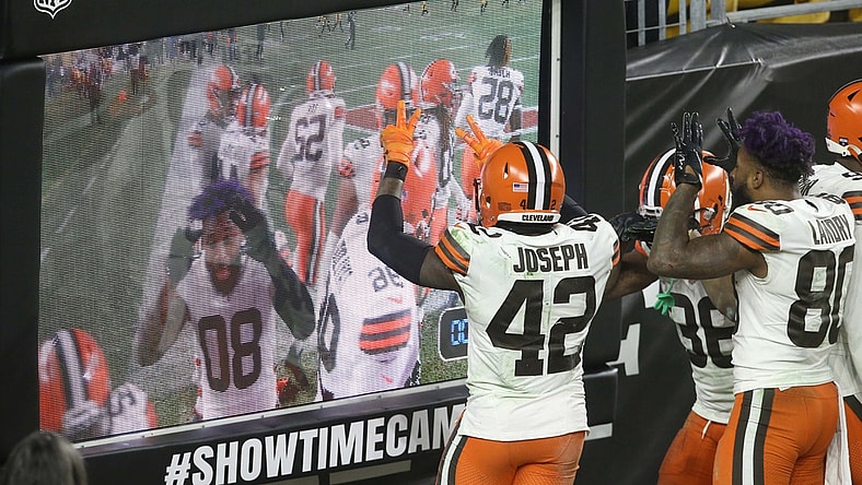 Jan 10, 2021; Pittsburgh, Pennsylvania, USA;  Cleveland Browns players including strong safety Karl Joseph (42) and wide receiver Jarvis Landry (80) celebrate at the showtime camera against the Pittsburgh Steelers during the fourth quarter at Heinz Field. The Browns won 48-37. Mandatory Credit: Charles LeClaire-USA TODAY Sports