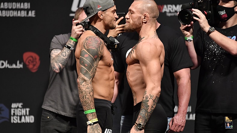 Jan 22, 2021; Abu Dhabi, UNITED ARAB EMIRATES;   Dustin Poirier and Conor McGregor of Ireland face off during the UFC 257 weigh-in at Etihad Arena on UFC Fight Island on January 22, 2021 in Abu Dhabi, United Arab Emirates. Mandatory Credit: Jeff Bottari/Handout Photo via USA TODAY Sports