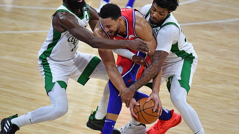 Jan 22, 2021; Philadelphia, Pennsylvania, USA; Philadelphia 76ers guard Ben Simmons (25) is trapped by Boston Celtics guard Jaylen Brown (7) and guard Marcus Smart (36) at Wells Fargo Center. Mandatory Credit: Eric Hartline-USA TODAY Sports