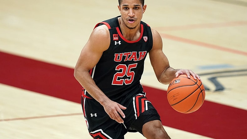 Feb 13, 2021; Stanford, California, USA; Utah Utes guard Alfonso Plummer (25) handles the ball during the second half against the Stanford Cardinal at Maples Pavilion. Mandatory Credit: Darren Yamashita-USA TODAY Sports