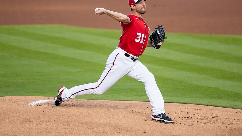 Mar 5, 2021; West Palm Beach, Florida, USA; Washington Nationals starting pitcher Max Scherzer (31) delivers a pitch against the St. Louis Cardinals during the first inning of a spring training game at FITTEAM Ballpark of the Palm Beaches. Mandatory Credit: Mary Holt-USA TODAY Sports