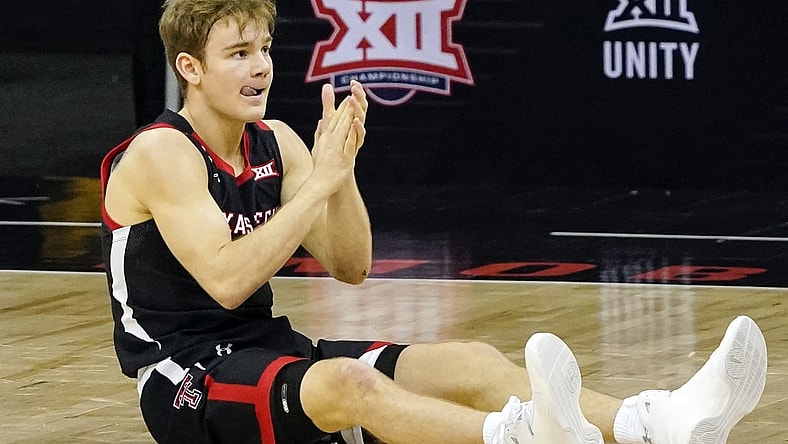 Mar 11, 2021; Kansas City, MO, USA; Texas Tech Red Raiders guard Mac McClung (0) reacts after a play against the Texas Longhorns during the second half at T-Mobile Center. Mandatory Credit: Jay Biggerstaff-USA TODAY Sports