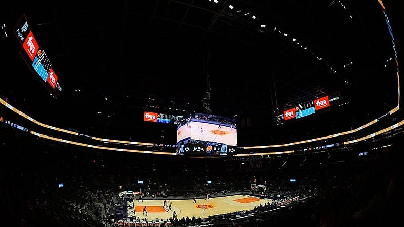 Mar 15, 2021; Phoenix, Arizona, USA; A general view of game action between the Phoenix Suns and the Memphis Grizzlies during the first half at Phoenix Suns Arena. Mandatory Credit: Joe Camporeale-USA TODAY Sports