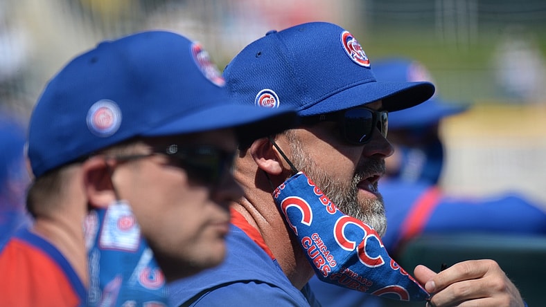 Mar 18, 2021; Goodyear, Arizona, USA; Chicago Cubs manager David Ross looks on against the Cleveland Indians during the first inning of a spring training game at Goodyear Ballpark. Mandatory Credit: Joe Camporeale-USA TODAY Sports