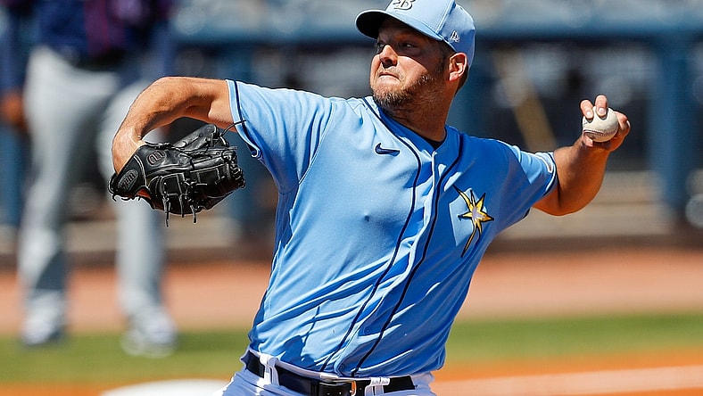 Mar 13, 2021; Port Charlotte, Florida, USA; Tampa Bay Rays starting pitcher Rich Hill (14) pitches the first inning  during spring training at Charlotte Sports Park. Mandatory Credit: Nathan Ray Seebeck-USA TODAY Sports