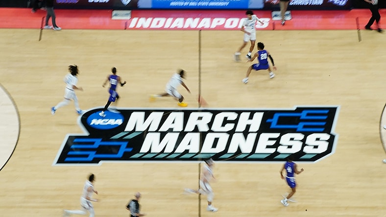Mar 22, 2021; Indianapolis, Indiana, USA; General view of the March madness logo during the game between the UCLA Bruins and the Abilene Christian Wildcats in the second round of the 2021 NCAA Tournament at Bankers Life Fieldhouse. Mandatory Credit: Kirby Lee-USA TODAY Sports