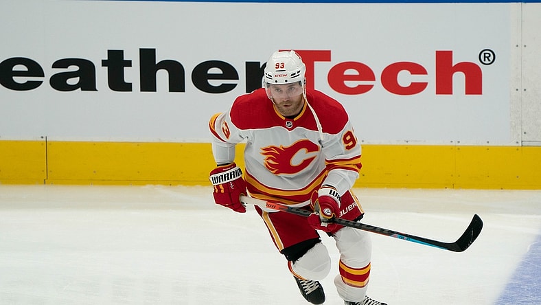 Mar 20, 2021; Toronto, Ontario, CAN; Calgary Flames center Sam Bennett (93) skates during the warm-up against the Toronto Maple Leafs at Scotiabank Arena. Mandatory Credit: Nick Turchiaro-USA TODAY Sports