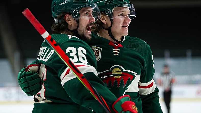 Mar 25, 2021; Saint Paul, Minnesota, USA; Minnesota Wild right wing Mats Zuccarello (36) celebrates with Minnesota Wild left wing Kirill Kaprizov (97) after Kaprizov scored a goal against the St. Louis Blues in the second period at Xcel Energy Center. Mandatory Credit: David Berding-USA TODAY Sports