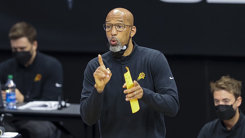 Mar 28, 2021; Charlotte, North Carolina, USA; Phoenix Suns coach Monty Williams directs his team against the Charlotte Hornets during the second quarter at Spectrum Center. Mandatory Credit: Nell Redmond-USA TODAY Sports