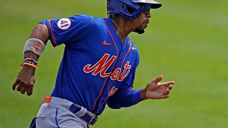 Mar 29, 2021; Jupiter, Florida, USA; New York Mets shortstop Francisco Lindor (12) rounds third base to score a run in the 1st inning of the spring training game against the St. Louis Cardinals at Roger Dean Chevrolet Stadium. Mandatory Credit: Jasen Vinlove-USA TODAY Sports