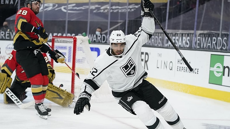 Mar 31, 2021; Las Vegas, Nevada, USA; Los Angeles Kings left wing Andreas Athanasiou (22) celebrates after scoring against the Vegas Golden Knights during the first period of an NHL hockey game at T-Mobile Arena. Mandatory Credit:  John Locher/POOL PHOTOS-USA TODAY Sports